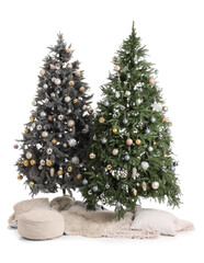 Beautiful Christmas trees with pouf and pillow on white background