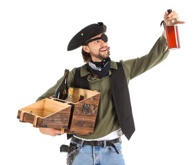 Young pirate with alcohol on white background