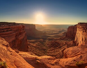 Towering Cliffs Overlooking a Vast Desert Canyon, With Jagged Rock Formations and Deep Red Sands Under the Midday Sun, Creating a Rugged, Timeless Landscape