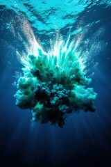A captivating underwater explosion creates a cloud of bubbles and particles, showcasing the beauty and power of marine phenomena.