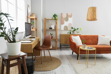 Interior of living room with programmer's workplace