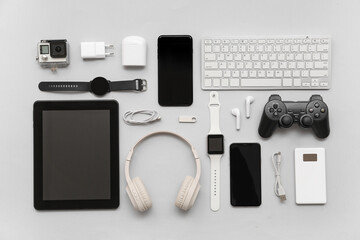 Composition with various modern devices on grey background