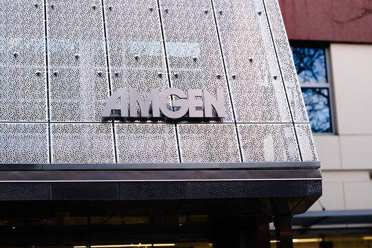 Cambridge, USA - 6 November 2024. close-up view of the Amgen building facade with logo. the innovative and contemporary spirit of this biotech giant in a sleek urban setting