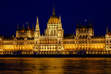 Fototapeta premium The stunning illumination of the Hungarian Parliament Building at night