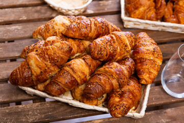 Delicious baked croissant served at table for dessert