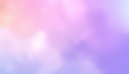 blurred background of a pink and blue sky with a few clouds