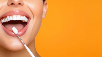 A close-up image shows a smiling mouth being examined with a dental instrument against an orange background, emphasizing dental care and oral hygiene.