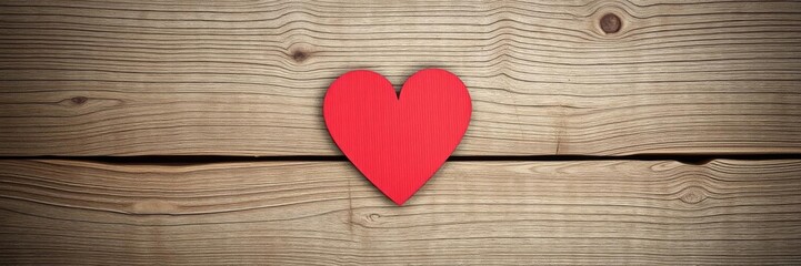 Fototapeta premium Red wicker heart symbolizing love on blue wooden backdrop, wooden, concept