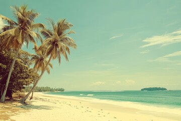 Obraz premium Palm trees on the beach with a turquoise ocean and a small island in the distance.