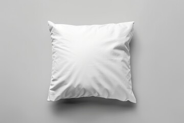 A single white pillow on a light gray background.