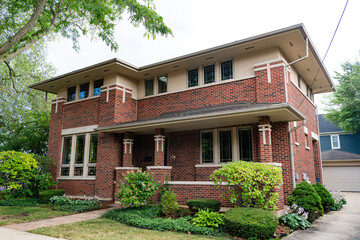 Housing neighborhood. Private house architecture. Private housing property. Residential suburban house. Suburban home in private residential housing. House exterior architecture. Affordable housing