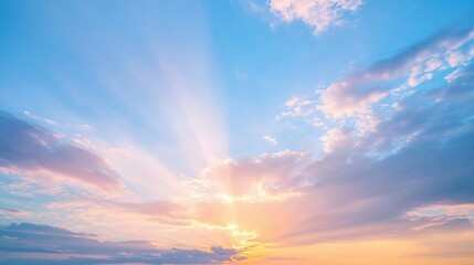 Naklejka premium Bright sunbeams painting sky in pastel shades