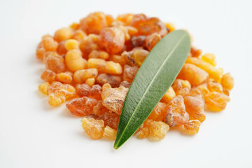 Frankincense or olibanum aromatic resin isolated on white background used in incense and perfumes.