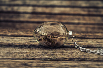 Christmas decoration - flask with feathers