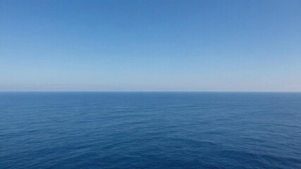 Fototapeta premium A serene and captivating view of the bright blue ocean meeting the distant horizon, sea, horizon ocean