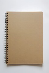 A blank spiral notebook with light brown paper mockup