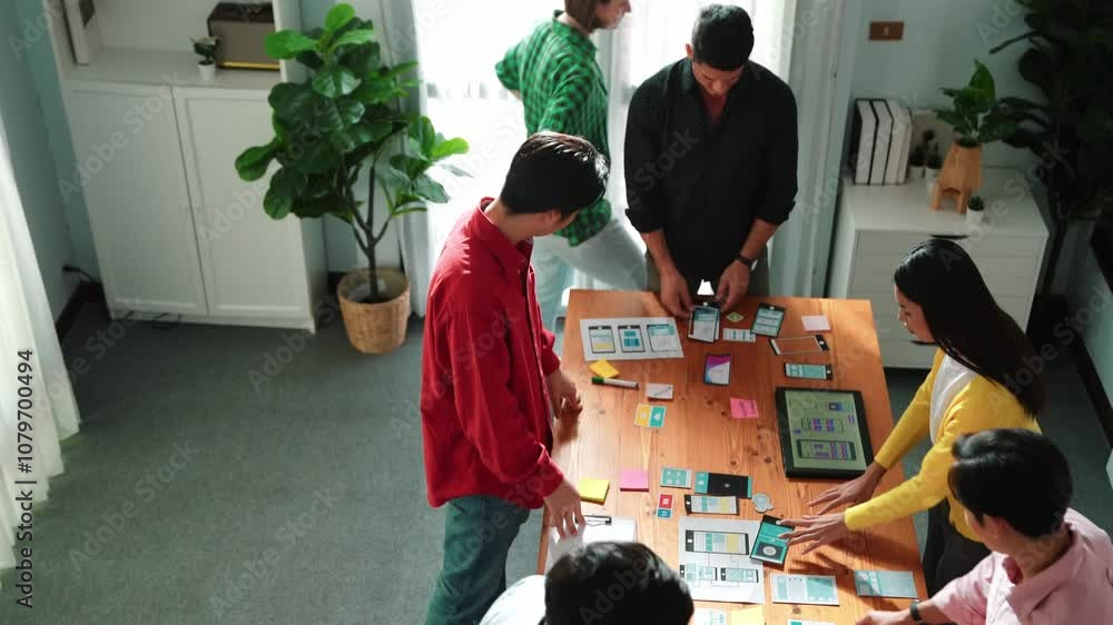 Poster top view of caucasian developer group planning for digital wireframe design. skilled diverse designe