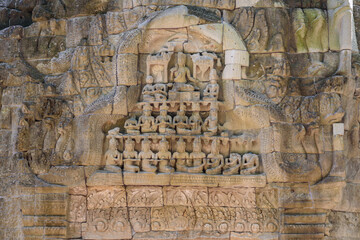 Bas-relief Sculpture at Ta Prohm temple, Siem Reap, Cambodia.