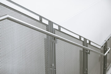 Stainless steel perf railing system, Single flat bar posts provide clean lines and minimal obstruction to line of sight.