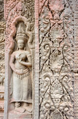 Bas-relief Sculpture at Ta Prohm temple, Siem Reap, Cambodia.