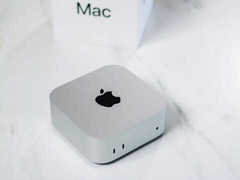 BANGKOK, THAILAND - NOV 14, 2024 : New Apple Mac Mini (2024). Latest Mac Mini model has been downsized to a 5-inch square, featuring the powerful M4 and M4 Pro Chip for integrated Apple Intelligence.