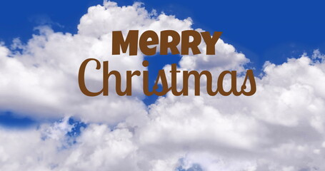 Fototapeta premium Image of merry christmas text over sky with clouds