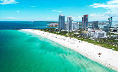 Aerial view of South Pointe Park. Miami Beach. Florida. USA. Summer holidays in Miami Beach. Aerial panoramic view of the city of Miami, buildings, marina, yachts and luxurious apartments.