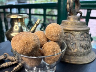 Exclusive shots of rare kerala traditional desert known as ari unda or rice laddu