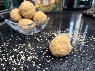 Exclusive shots of rare kerala traditional desert known as ari unda or rice laddu