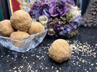 Exclusive shots of rare kerala traditional desert known as ari unda or rice laddu