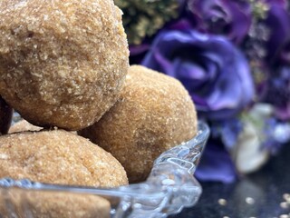 Exclusive shots of rare kerala traditional desert known as ari unda or rice laddu
