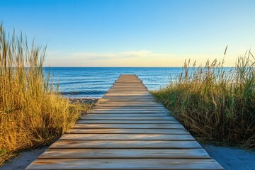 Obraz premium Wooden walkway leading to the ocean.
