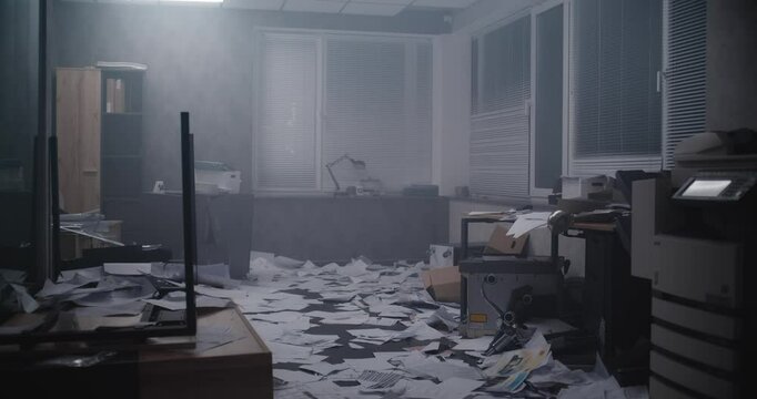 Office robbery at night or murder case: Papers and office equipment scattered at crime scene. Evidence under numbered markers. Crime show or detective movie. Crime investigation concept. Dolly Shot.