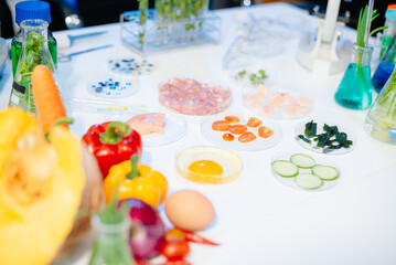 Explore a modern food science lab with fresh samples, test tubes, and microscopes. Ideal for biotechnology