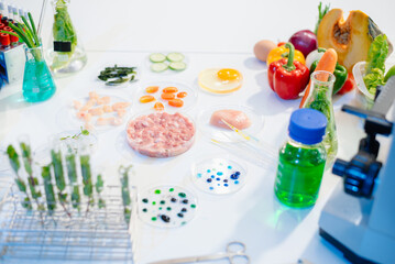 Explore a modern food science lab with fresh samples, test tubes, and microscopes. Ideal for biotechnology