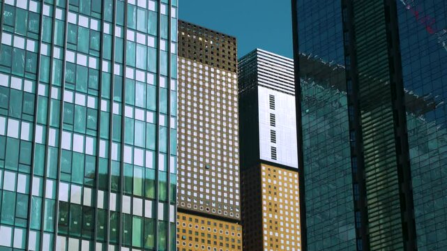Glass Facade Windows Of Modern Office Buildings In Jongno-gu District In Seoul, South Korea. Tilt Up Shot