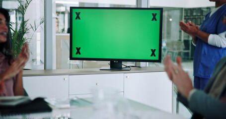 Doctor, group and monitor with green screen or applause for webinar, online presentation or virtual meeting at hospital. Team, medical employees or clapping with mockup, space or tracking markers