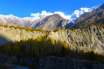 Scenic view of the ridge of Ultar Sar massif that rises precipitously above the Hunza valley...