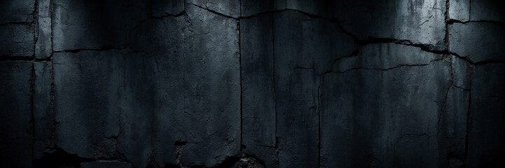 Fototapeta premium A black and white photo of a wall with cracks and holes