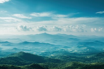 A scenic view of mountains and a blue sky.