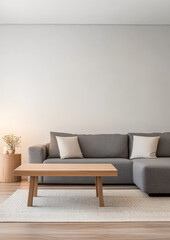 Cozy modern living room with a grey sofa and wooden coffee table in a minimalist setting