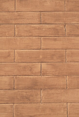 New light  brown painted brick wall closeup