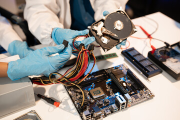 Close up of Technician measuring voltage electronic circuit board, Service after sale fix electric...