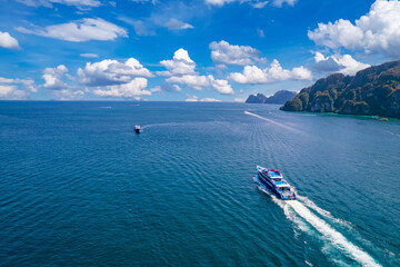 Large ship ferry from Phuket to Phi Phi, Krabi Thailand. Amazing travel landscape photo in Thai