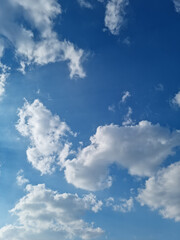 Obraz premium Blue sky and puffy clouds.