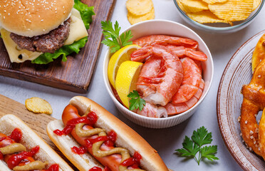 A vibrant photo showcasing various beer snacks and fast food