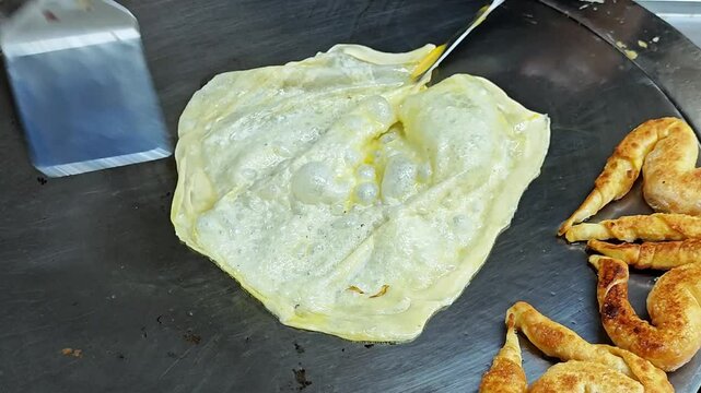 Making traditional Indian food called Roti