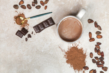Cocoa in different presentations, hot drink, beans, powder and chocolate bar	