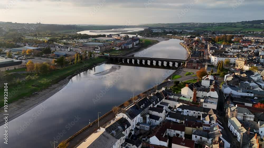 Wall mural Aerial 4K View of The Barnstaple Historic Long Bridge Over the River Taw in North Devon, England