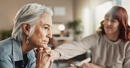 Psychologist, talking and senior woman with support and mental health assessment in consultation....